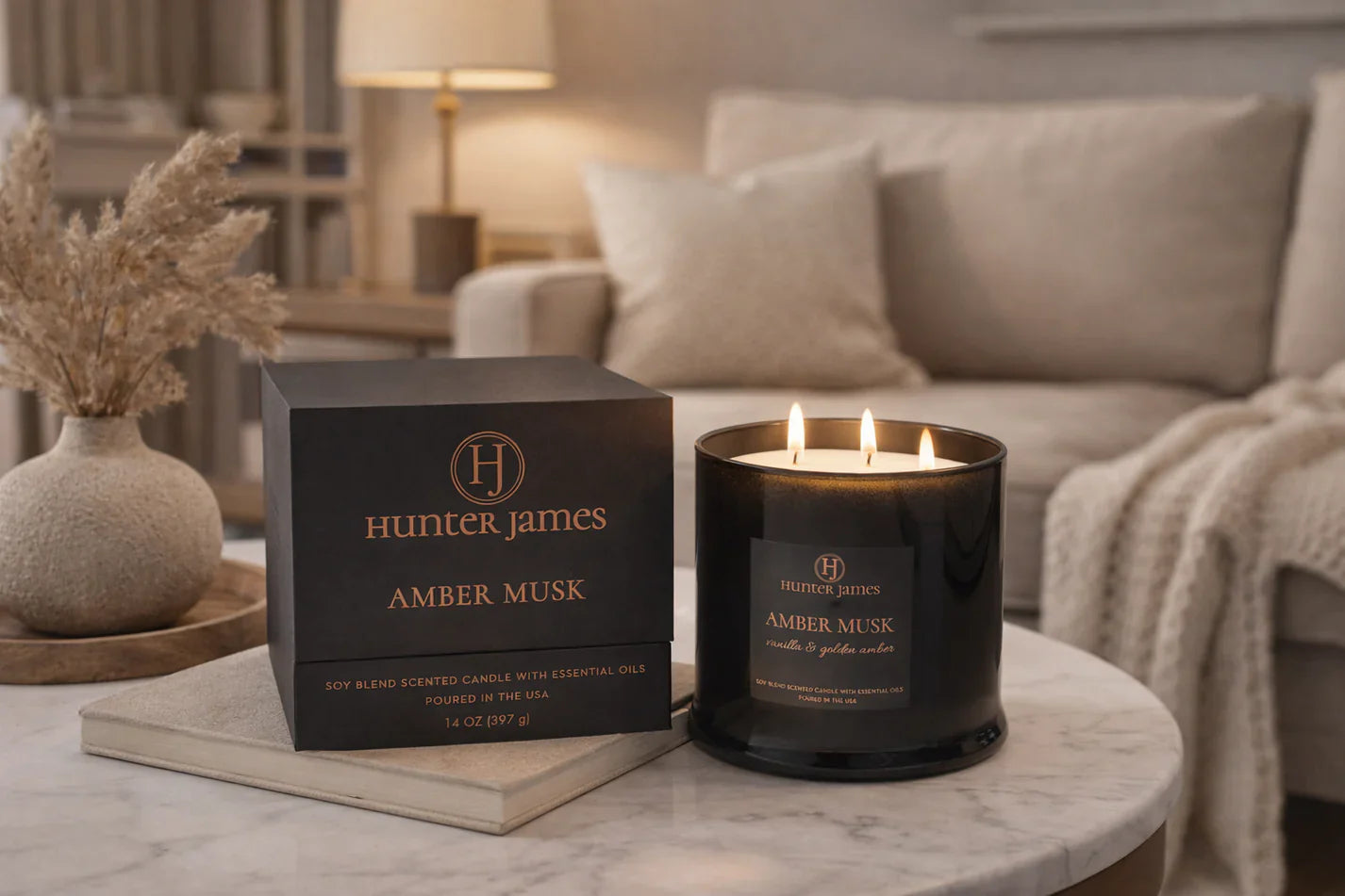 amber-musk-3-wick-candle-in-cozy-room