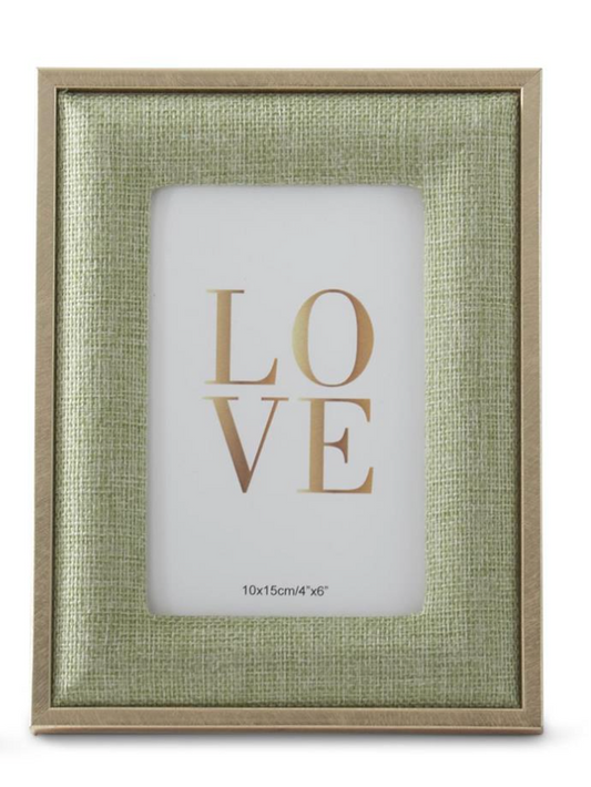 Petite light green woven linen photo frame with gold-tone trim designed to hold a 4-by-6-inch photograph.