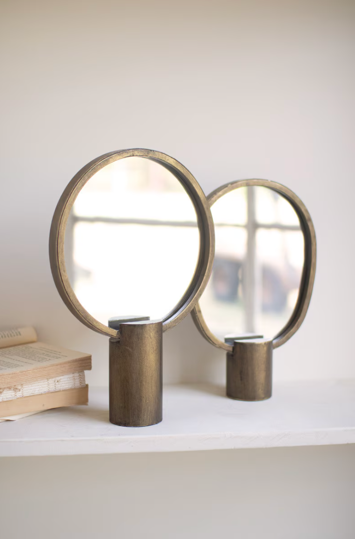 Petite and Grande antique brass tabletop mirrors styled together