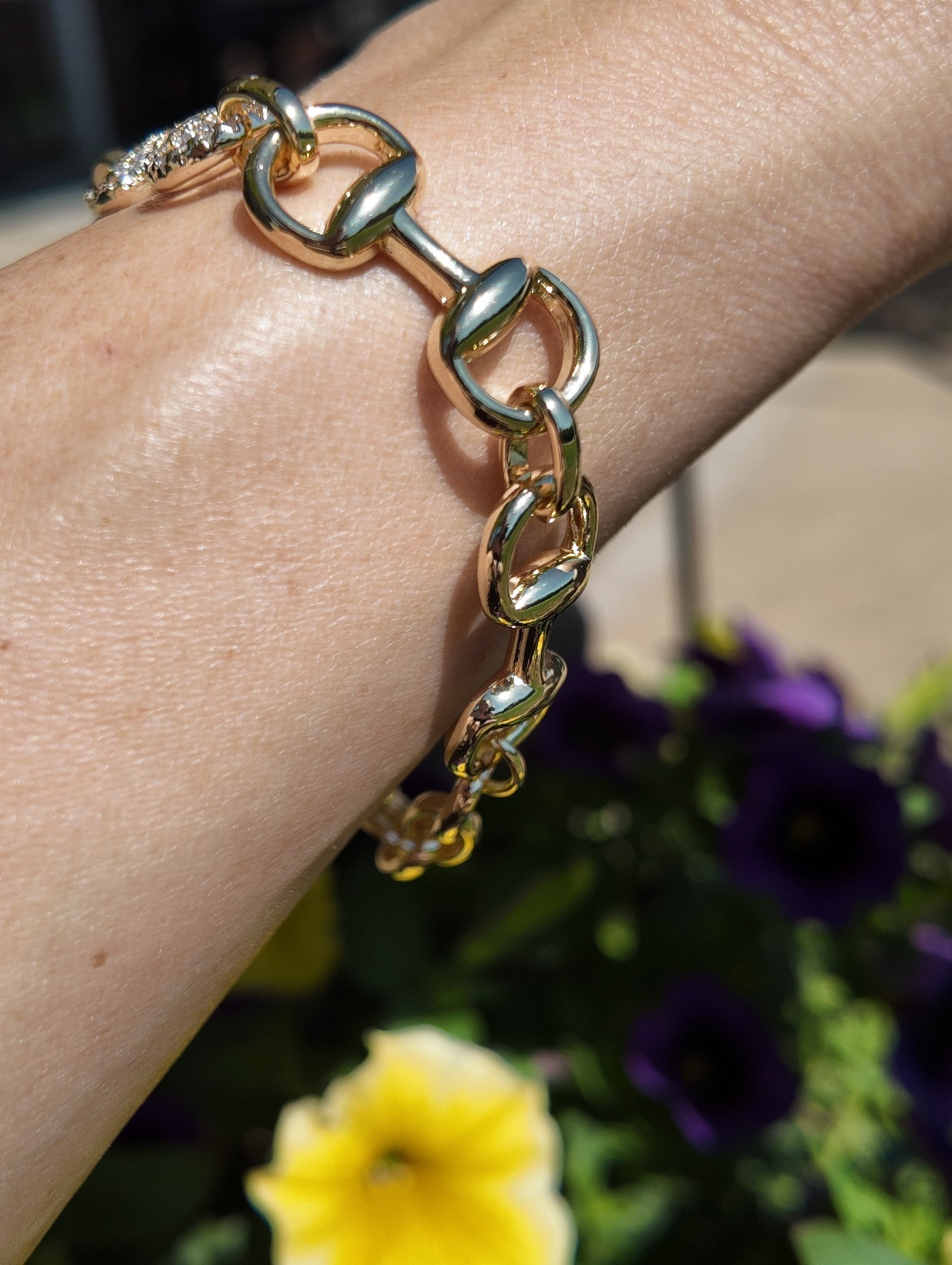     Side profile view of Adelaide horsebit link bracelet worn on wrist