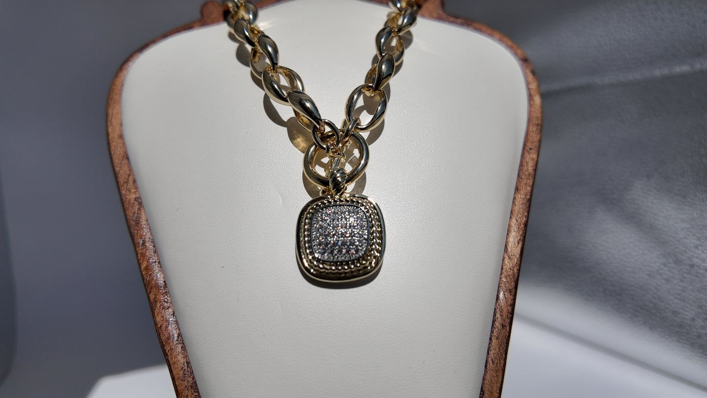 Close-up detail of pavé pendant on the Celeste Toggle Necklace