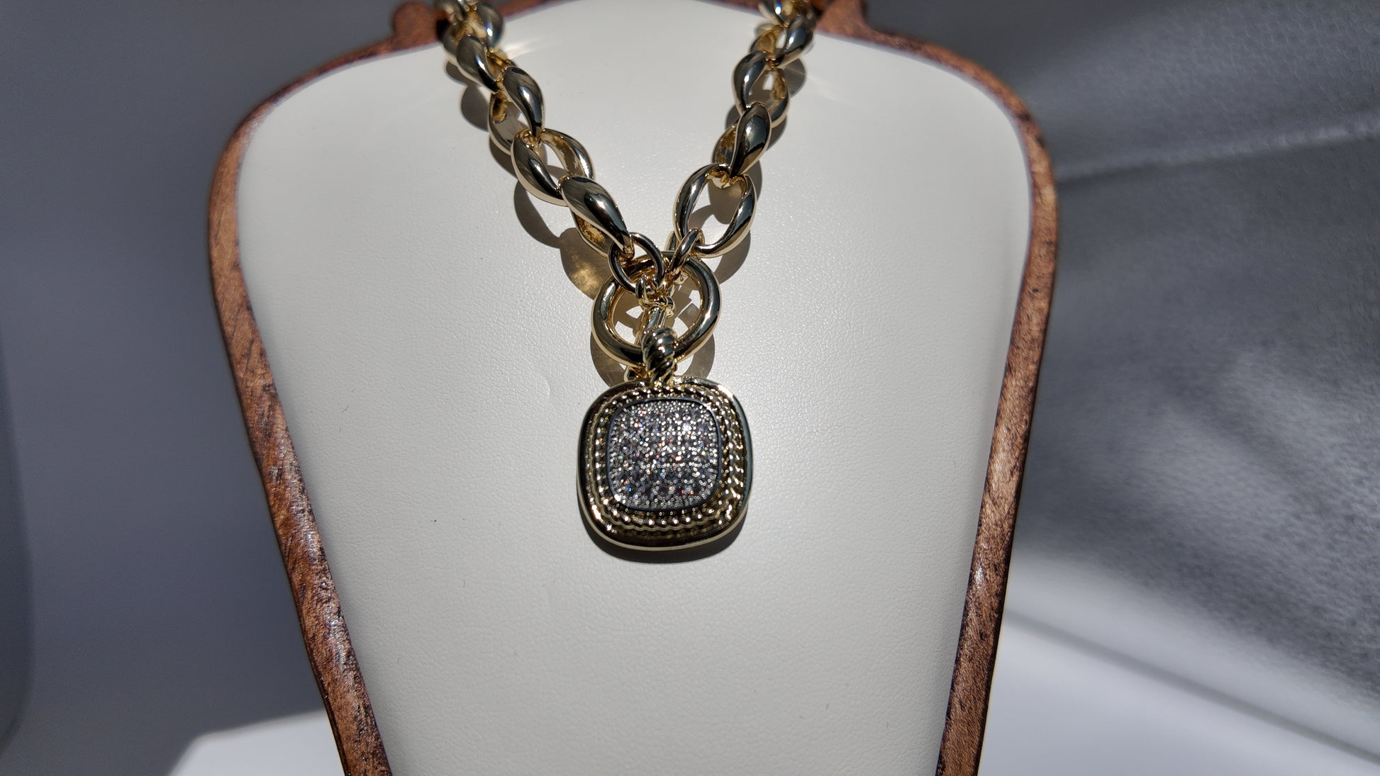 Close-up detail of pavé pendant on the Celeste Toggle Necklace