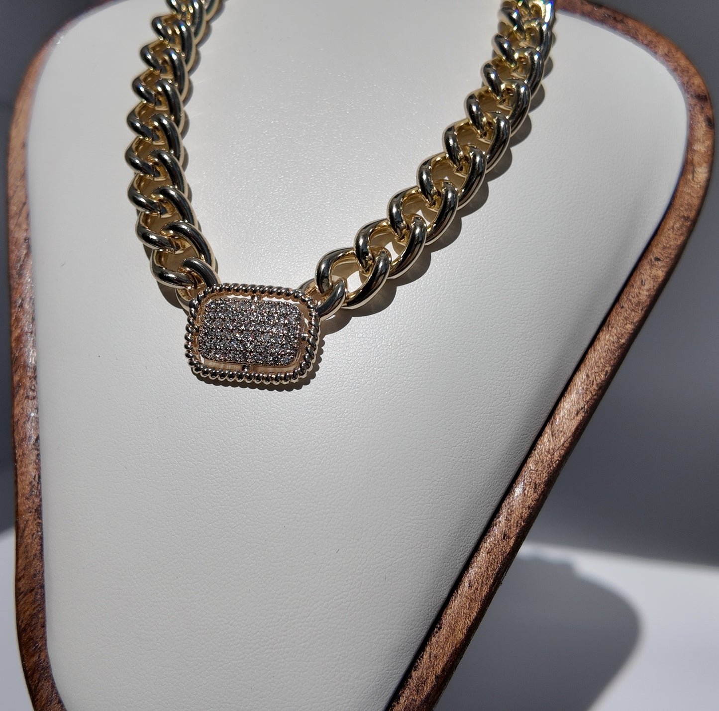 Close-up detail of pavé centerpiece on the Colette gold link necklace