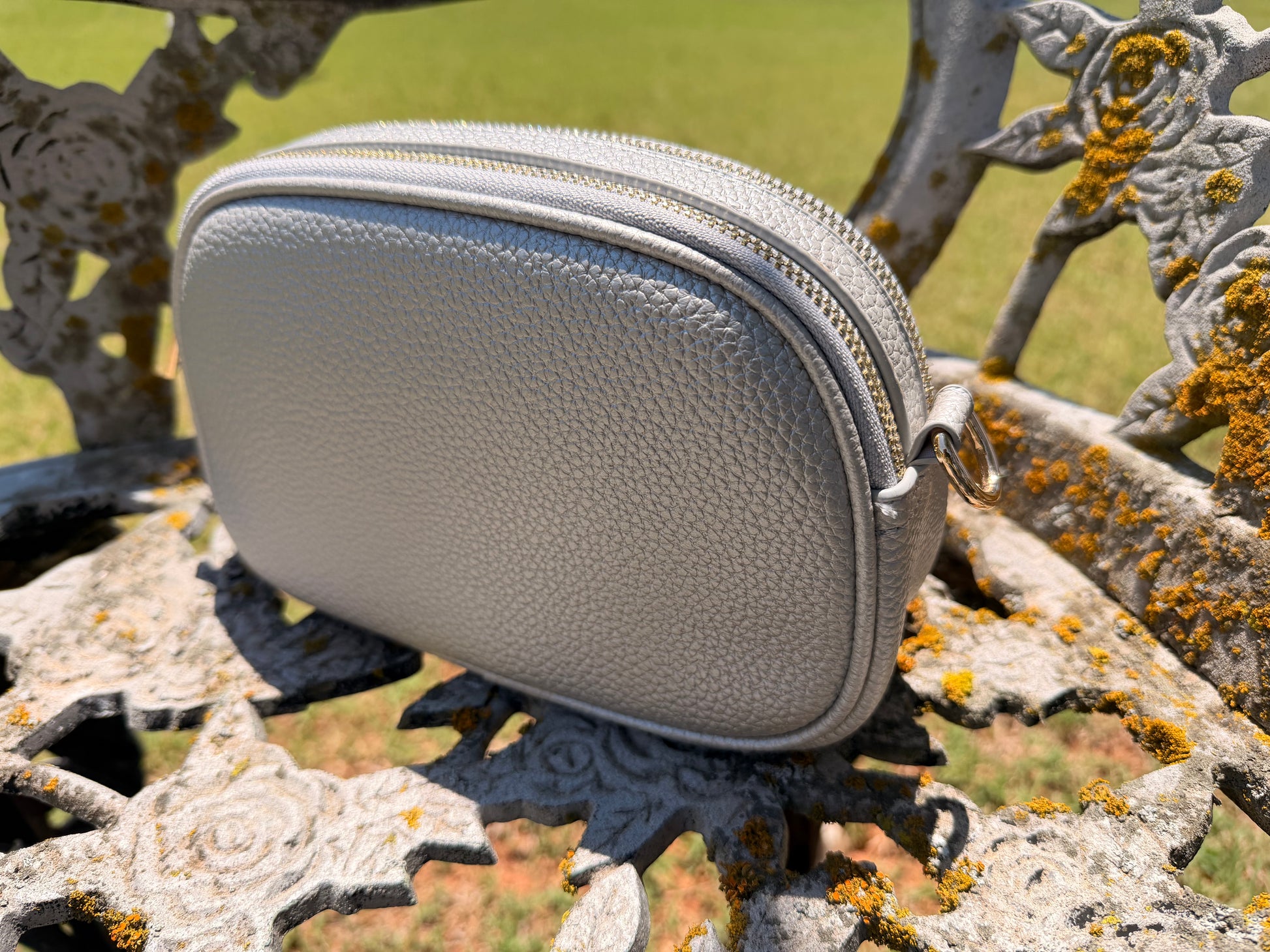 Side profile of The Elodie Pebble Crossbody in Moonlit Silver featuring a softly structured silhouette and pebble texture.