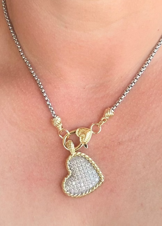     Woman wearing Kimberly Pavé Two-Tone Heart Necklace in gold and silver mixed metal design