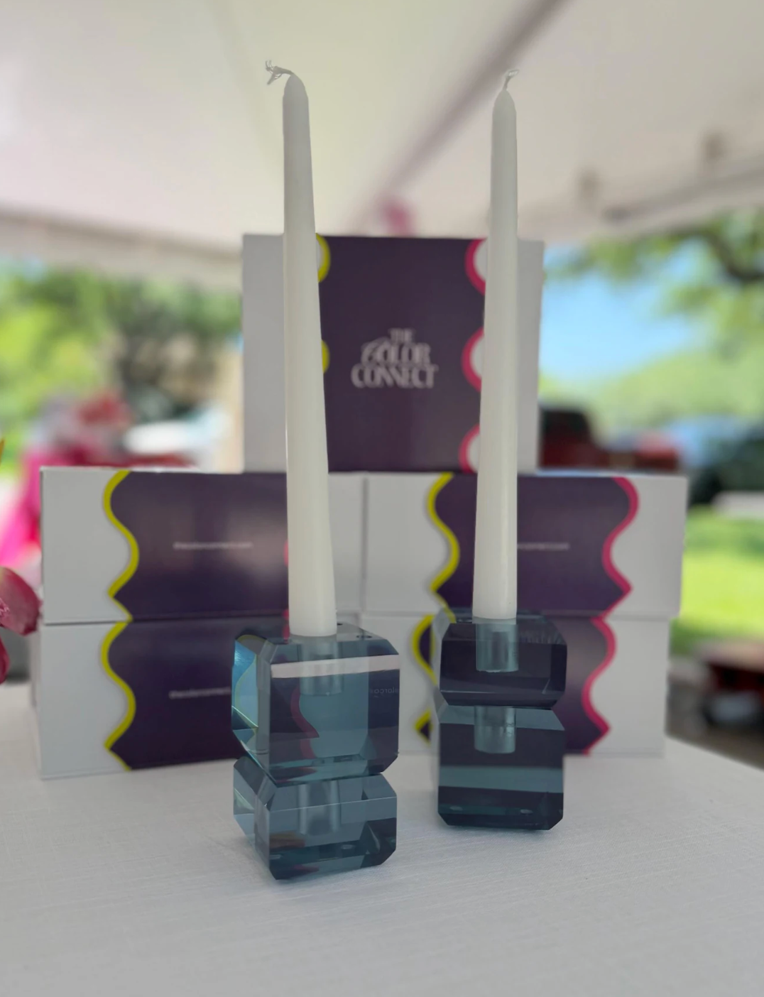Rain Prism Resin Taper Holder Set in translucent deep blue resin with four stackable modern taper candle holders.
